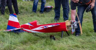 a person setting up an rc plane