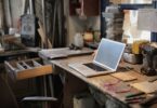 laptop on table in workshop